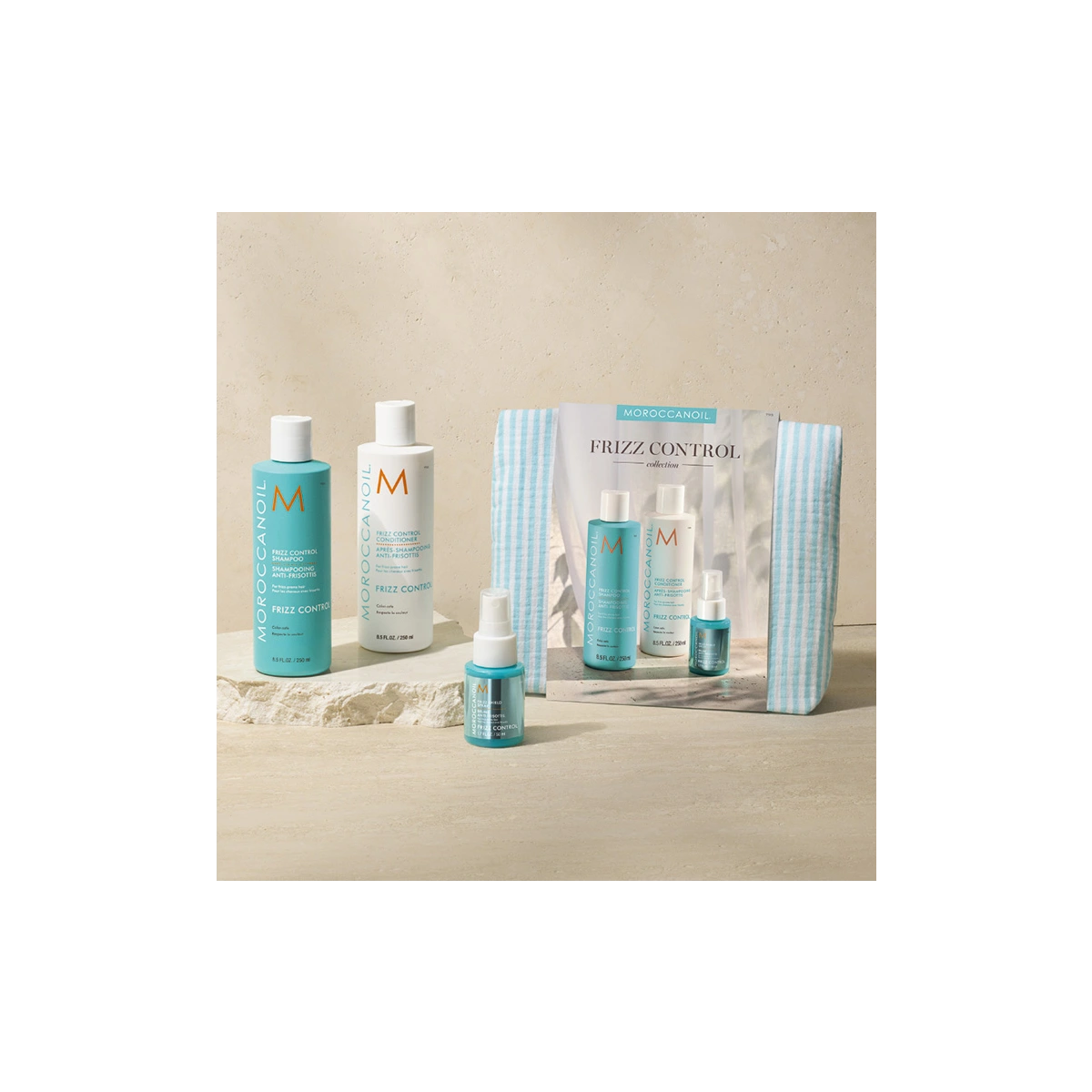 Moroccanoil Весенний набор в полос косметичке Frizz Control (шампунь 250 + кондиционер 250 + спрей-защита 50 мл)