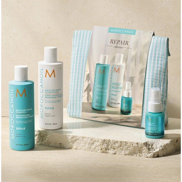 Moroccanoil Весенний набор в полос.косметичке Repair (шампунь 250 + кондиционер 250 + несм.кондиц 50 мл)